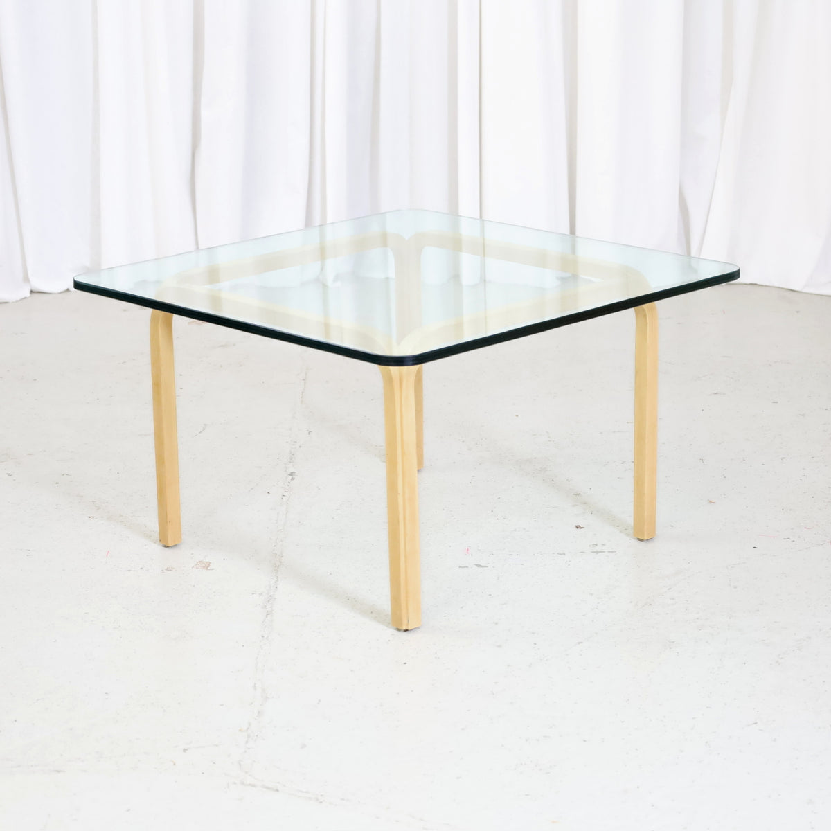 Artek Y805A glass coffee table by Alvar Aalto, angled front view
