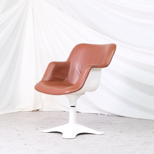 Set of four vintage Yrjö Kukkapuro Junior chairs by Haimi with cognac upholstery and white swivel bases