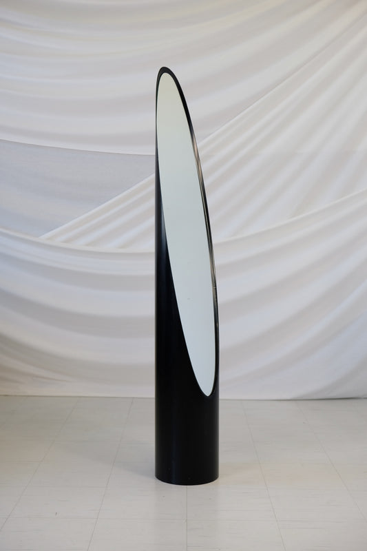 Unghia Lipstick Mirror by Rodolfo Bonetto, tall black cylindrical floor mirror with asymmetrical cut revealing inset mirror, 1980s Italian postmodern design.