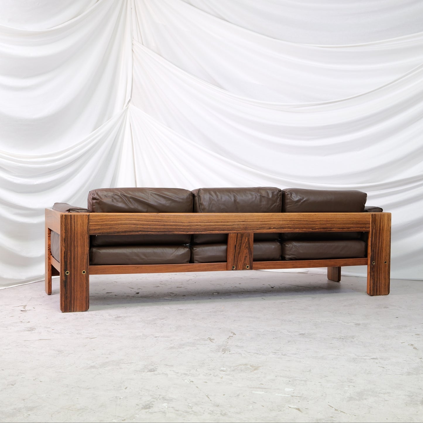 Vintage Tobia Scarpa Bastiano 3-seater sofa with dark brown leather cushions and wooden frame