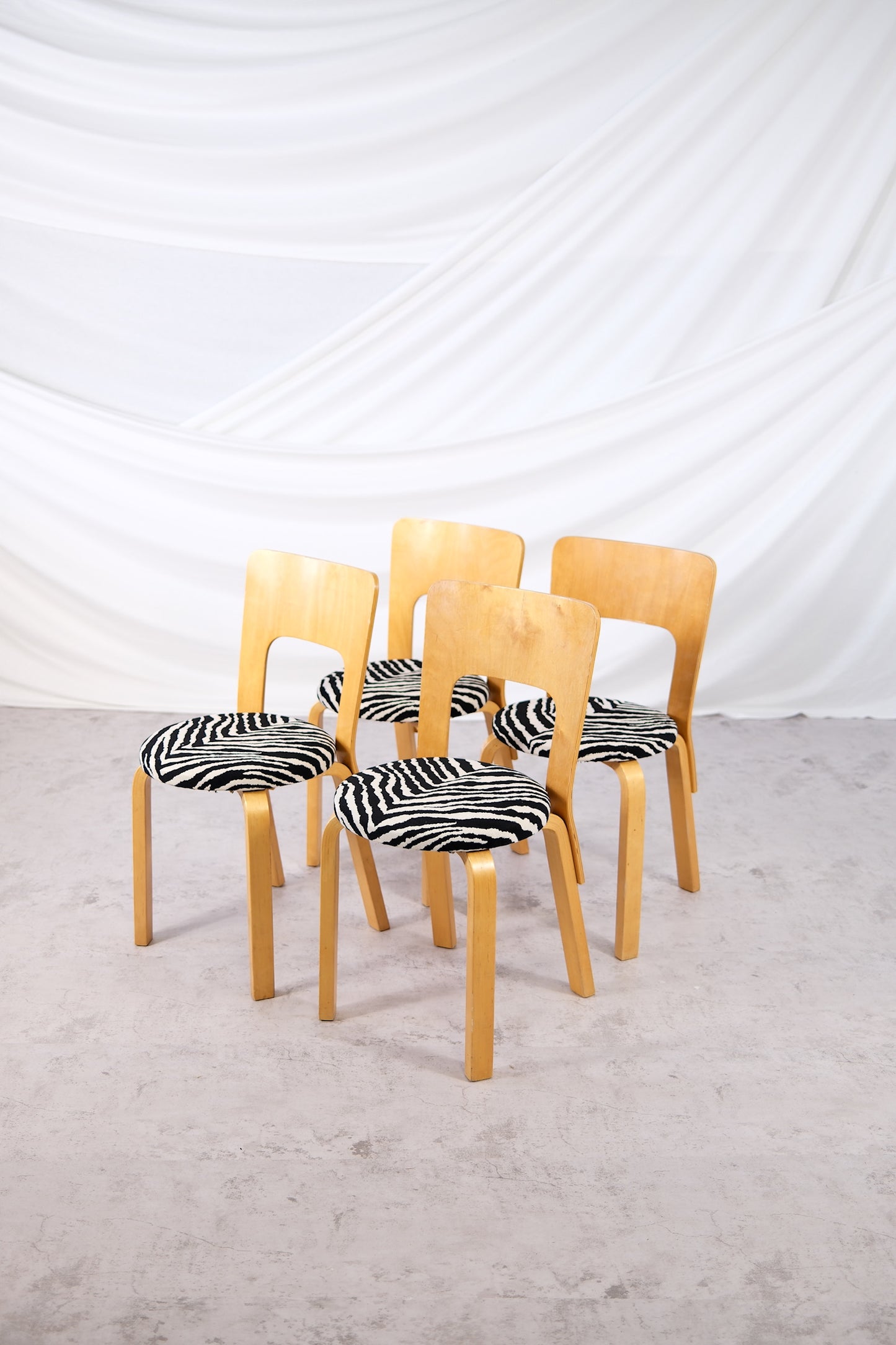Artek 66 Chairs with Zebra Upholstery, by Alvar Aalto