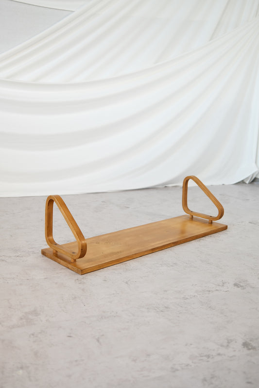 Rare Alvar Aalto 1930s wall shelf with pegs, birch honey patina
Early production Aalto shelf by O.Y. Huonekalu- ja Rakennustyötehdas, Finland
Collectible Artek Aalto wall shelf, 1930s Finnish design classic
Vintage bentwood wall shelf by Alvar Aalto with patina