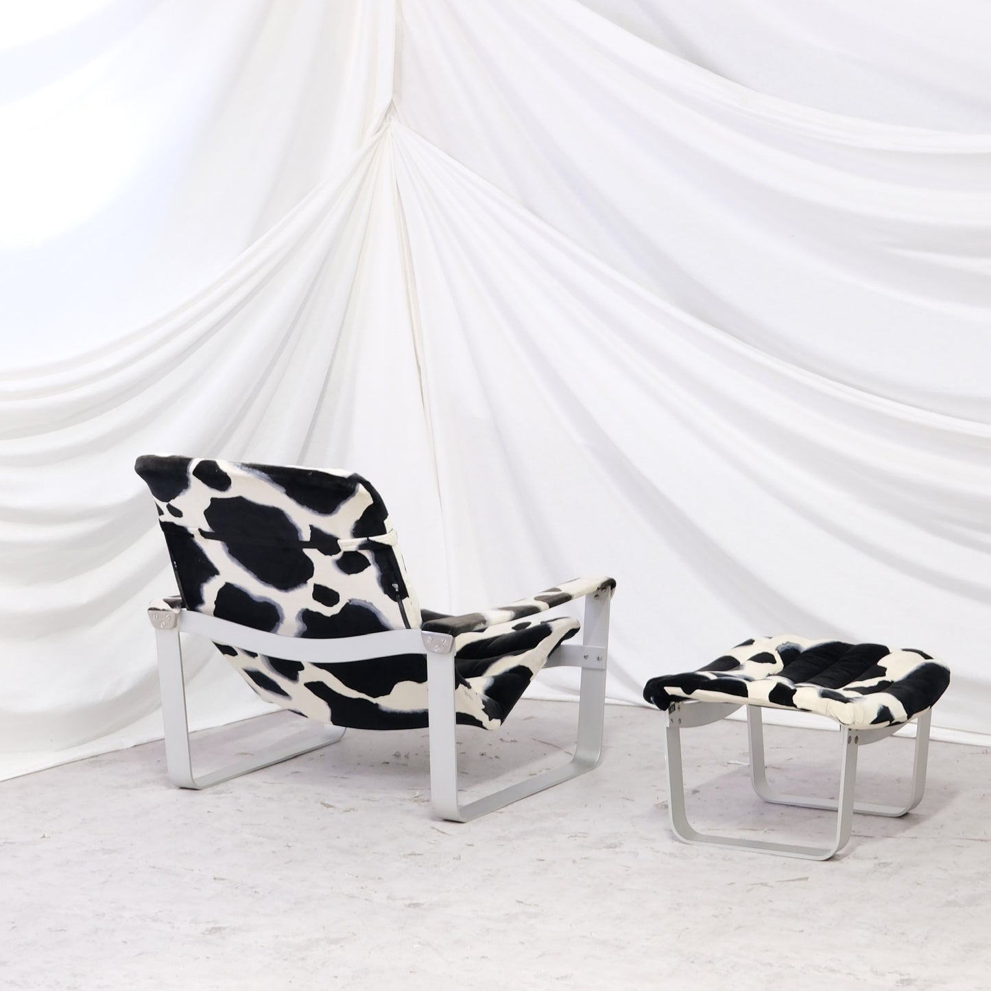 Ilmari Lappalainen Pulkka Lounge Chair with Ottoman – Cowhide Print Canvas