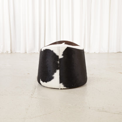 Niels Gammelgaard IKEA Stockholm cowhide swivel ottoman – End view with seam