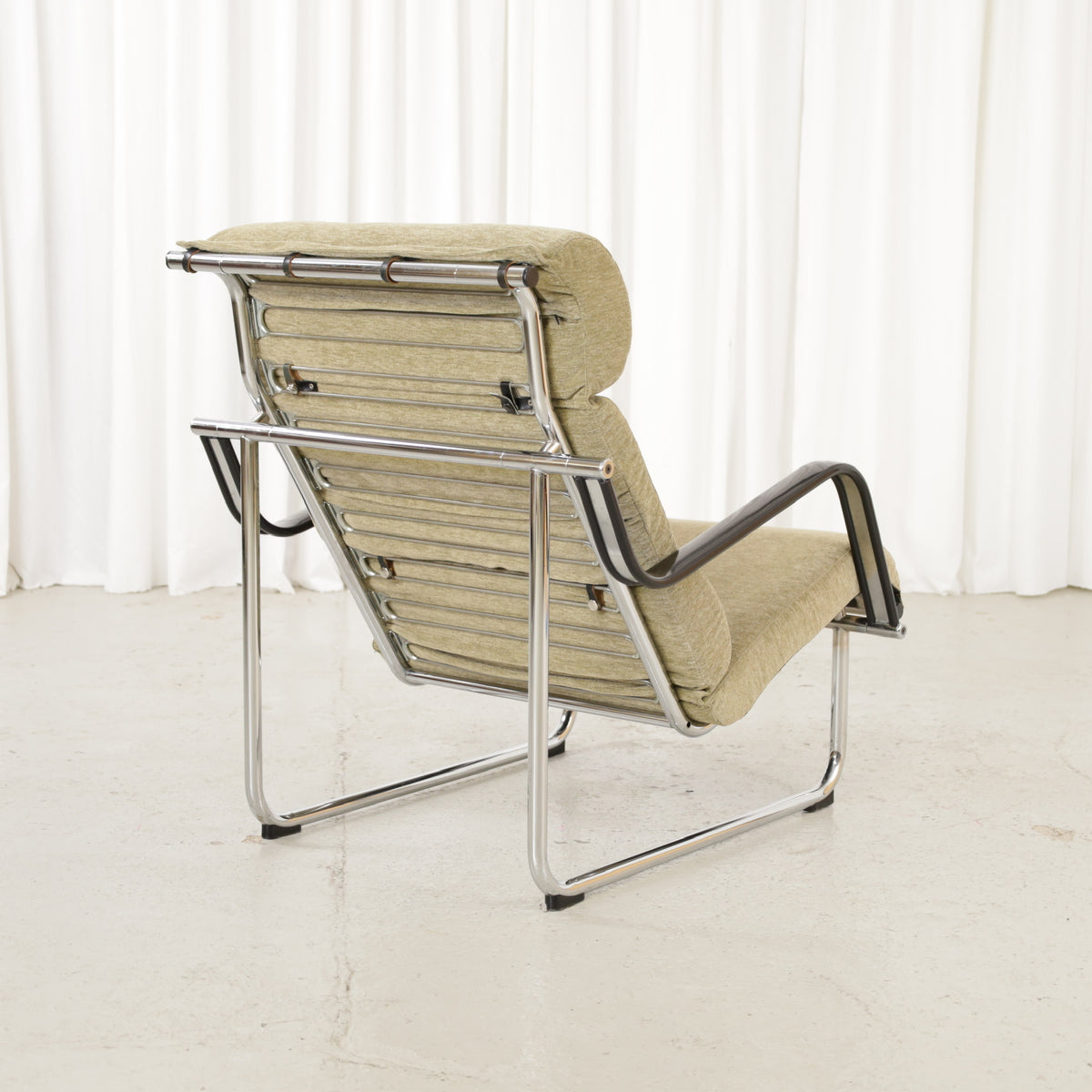 Avarte Remmi lounge chair, rear three-quarter view