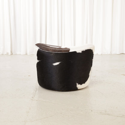 Niels Gammelgaard IKEA Stockholm cowhide swivel ottoman – Opposite angled view