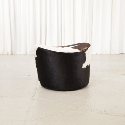 Niels Gammelgaard IKEA Stockholm cowhide swivel ottoman – Front angled view