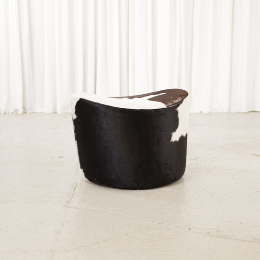 Niels Gammelgaard IKEA Stockholm cowhide swivel ottoman – Front angled view