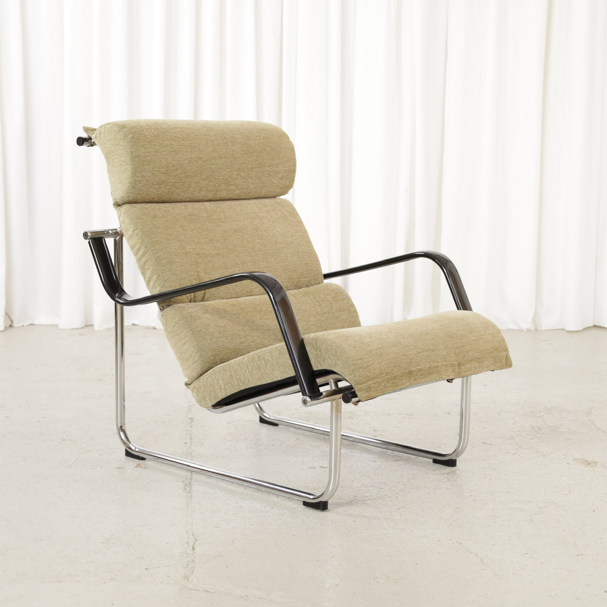 Green fabric Remmi lounge chair, opposite front view