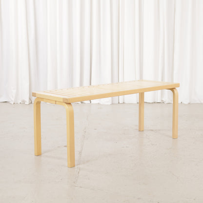 Alvar Aalto Artek 153A birch bench – Front angled view