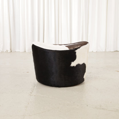 Niels Gammelgaard IKEA Stockholm cowhide swivel ottoman – Curved cowhide seat and side view