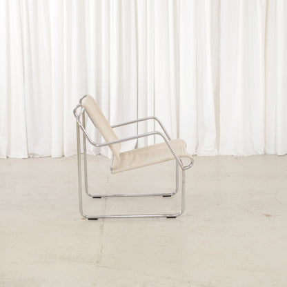Yrjö Kukkapuro Pressu armchair by Avarte with light linen upholstery and a chrome frame