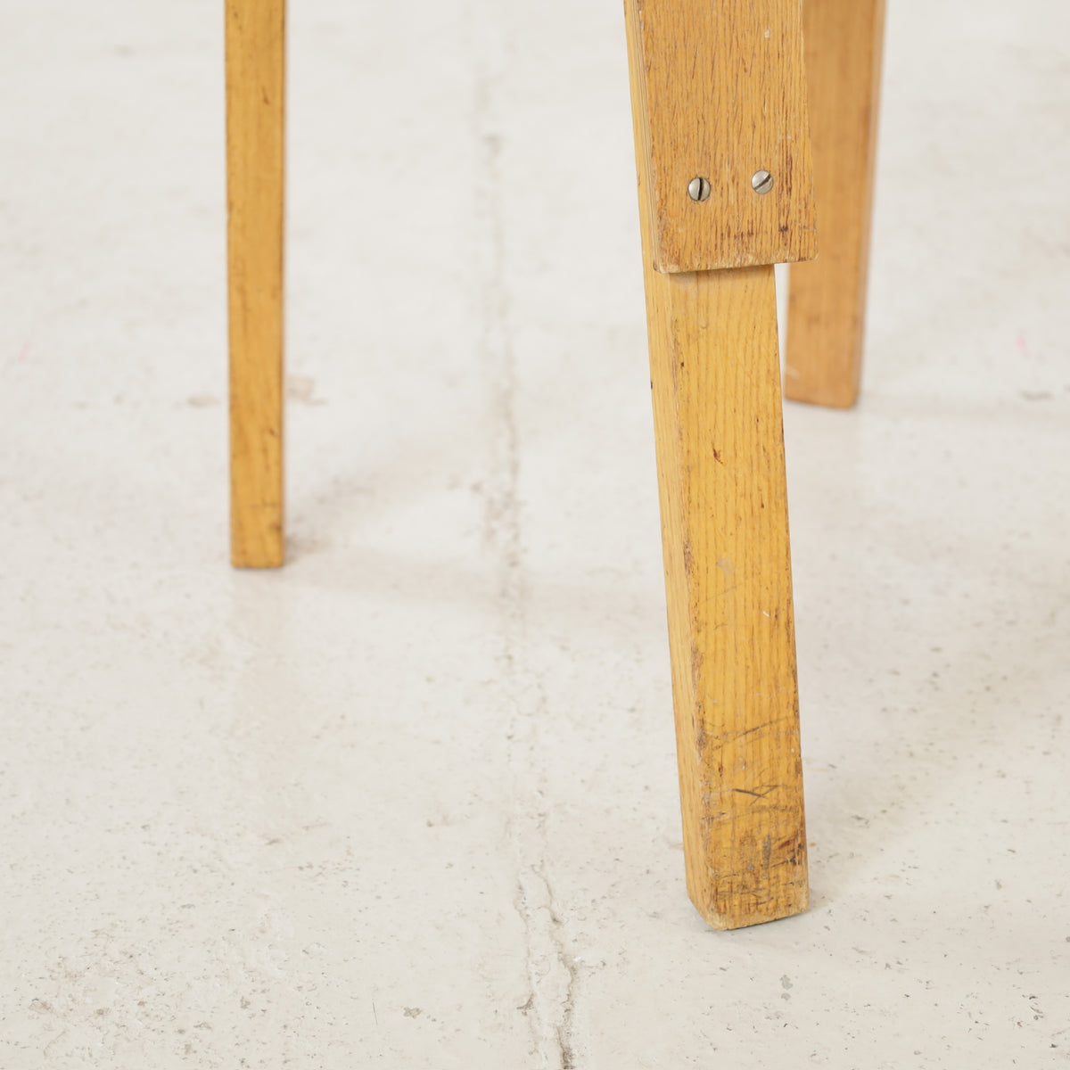 Chair 66 patinated rear leg detail
