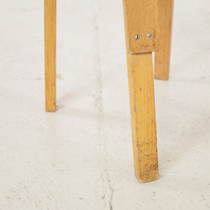 Chair 66 patinated rear leg detail