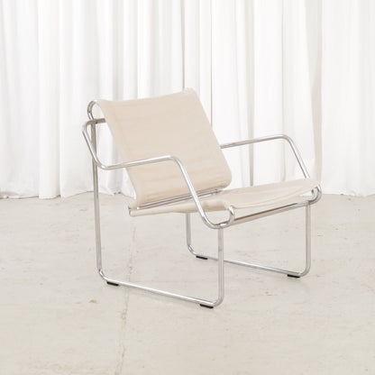 Yrjö Kukkapuro Pressu armchair by Avarte with light linen upholstery and a chrome frame