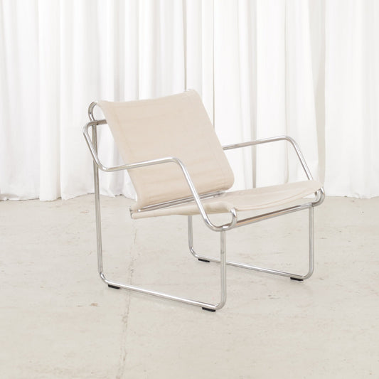 Yrjö Kukkapuro Pressu armchair by Avarte with light linen upholstery and a chrome frame