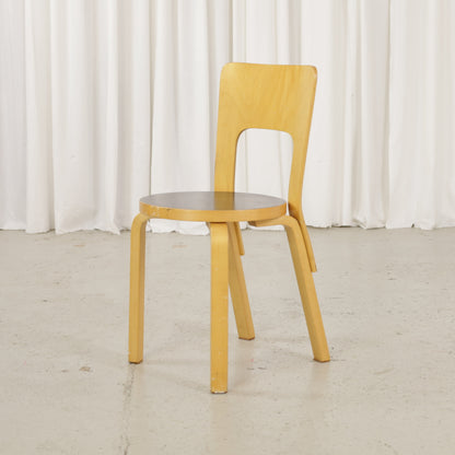 Chair 66 in birch and black linoleum, front angled view