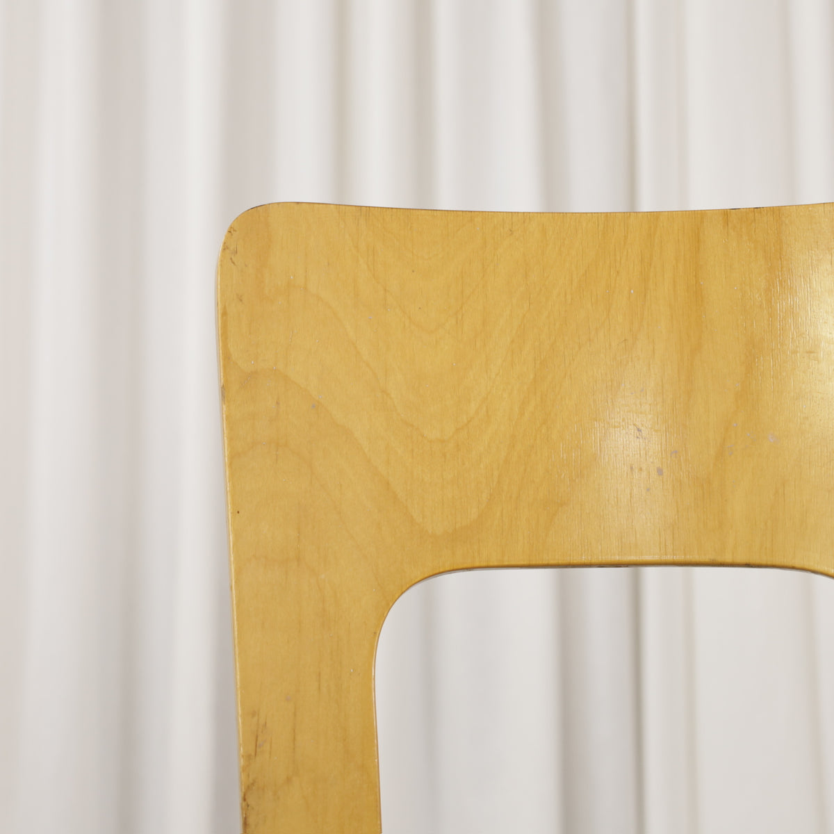 Chair 66 black linoleum seat close-up