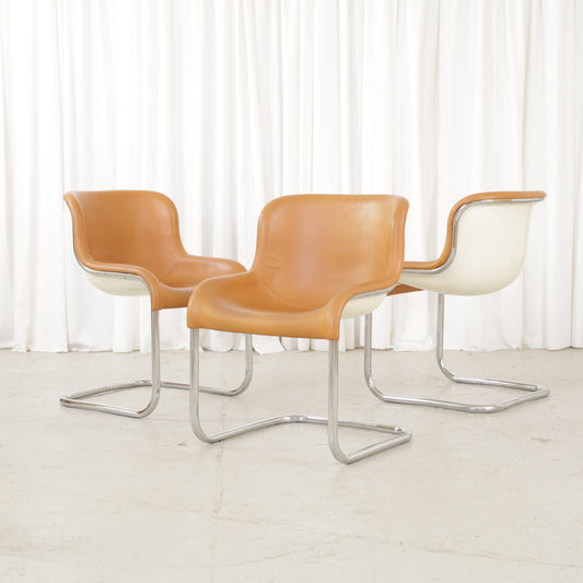 Three Esko Pajamies Elefantti chairs in cognac leather by Asko, front and rear views