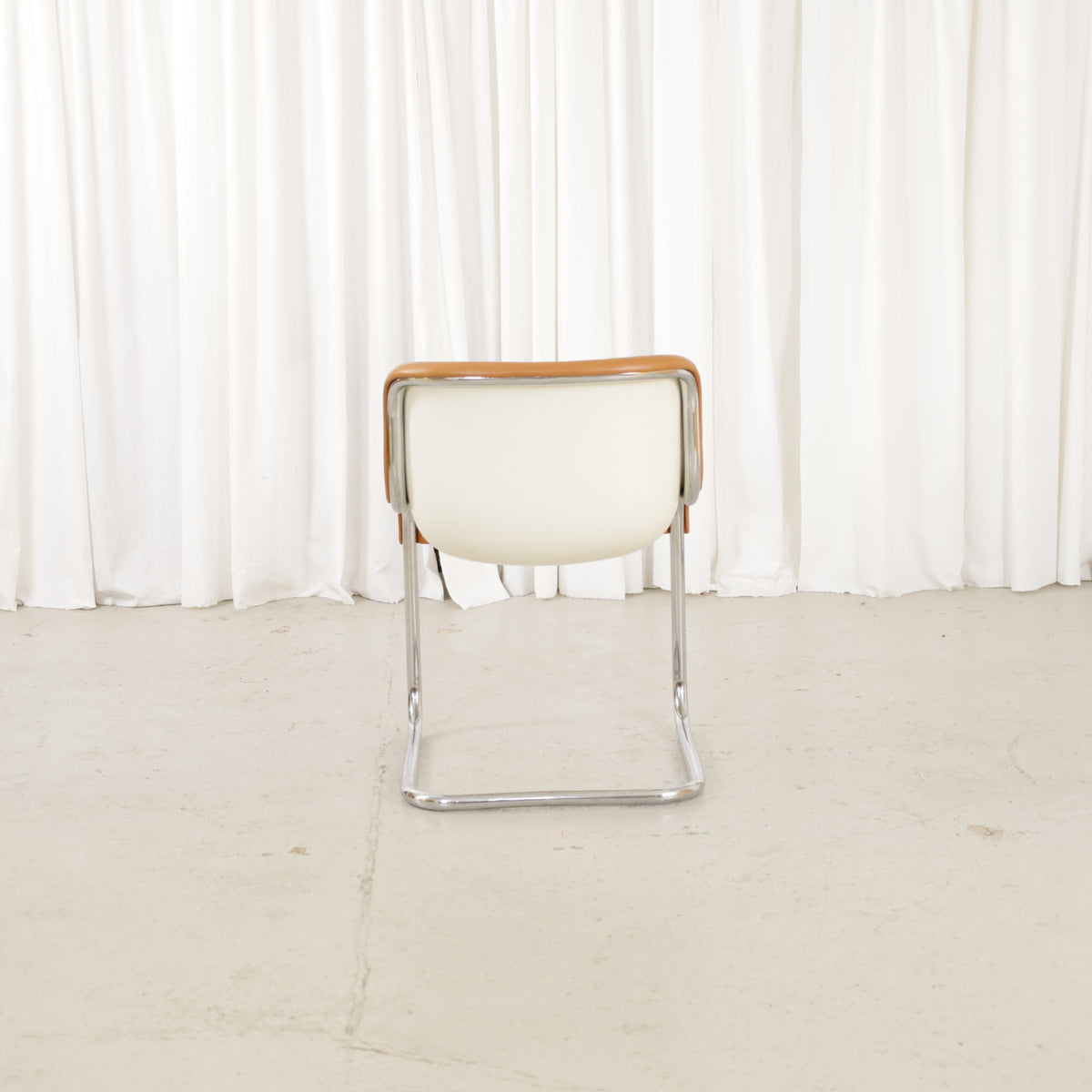 Asko Elefantti chair, cream shell from the rear