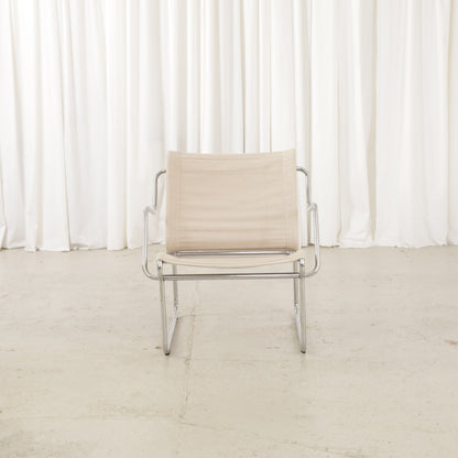 Yrjö Kukkapuro Pressu armchair by Avarte with light linen upholstery and a chrome frame