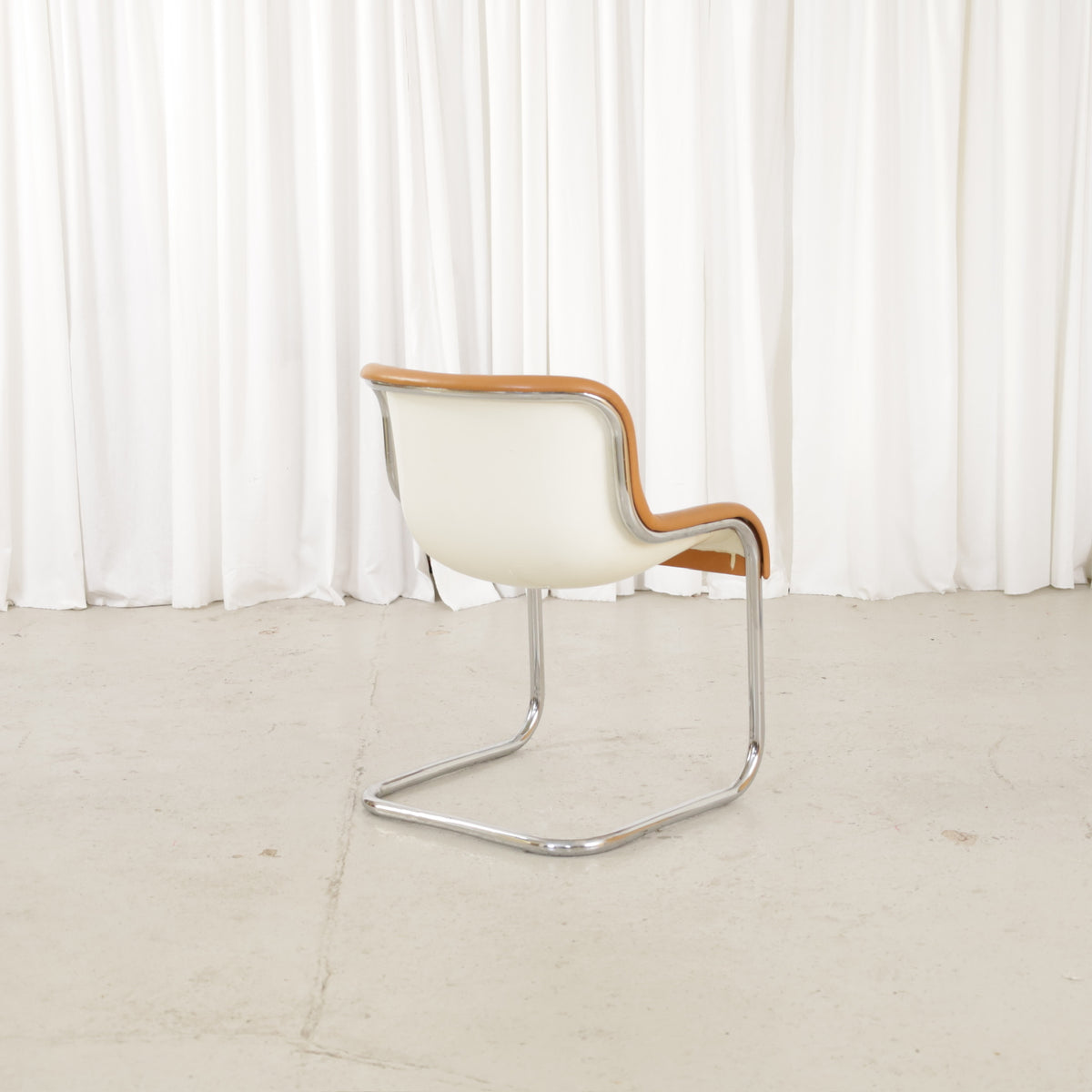 Asko Elefantti chair with cream shell and chrome cantilever base, rear view