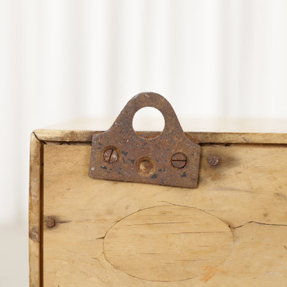 Medicine cabinet rear hanging bracket with rust and wood cracking