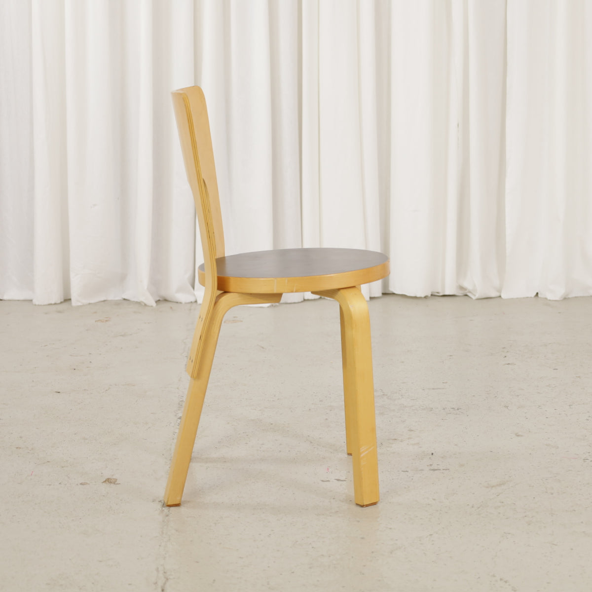 Chair 66 with black linoleum, opposite side view