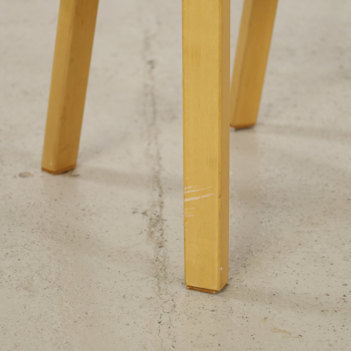 Chair 66 scuffs on front wooden seat edge