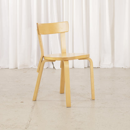 Alvar Aalto Artek Chair 69 in patinated birch, front three-quarter view