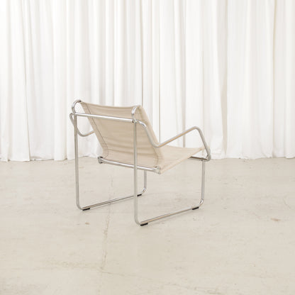 Yrjö Kukkapuro Pressu armchair by Avarte with light linen upholstery and a chrome frame