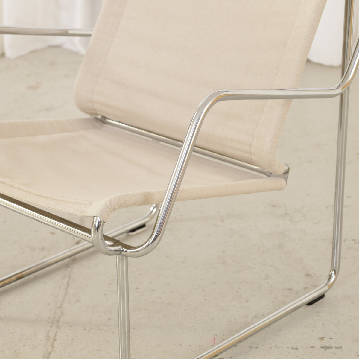 Yrjö Kukkapuro Pressu armchair by Avarte with light linen upholstery and a chrome frame