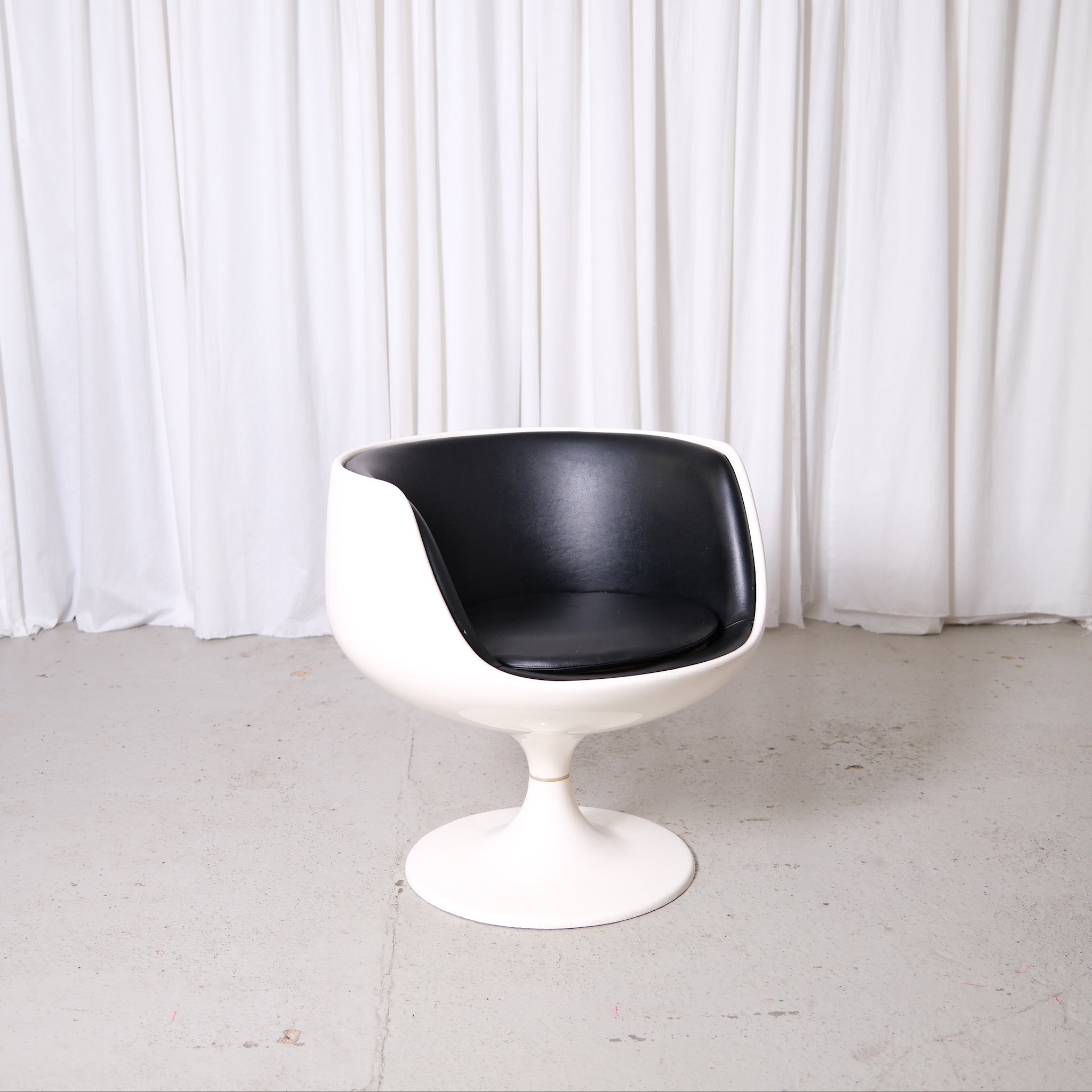 Eero Aarnio Cognac Chair by Asko in Black Leather – Pino Interiors