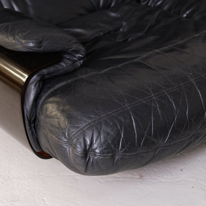 Detail of leather creasing and small surface marks on seat cushion