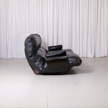 Side view of Marsala sofa with smoked acrylic shell
