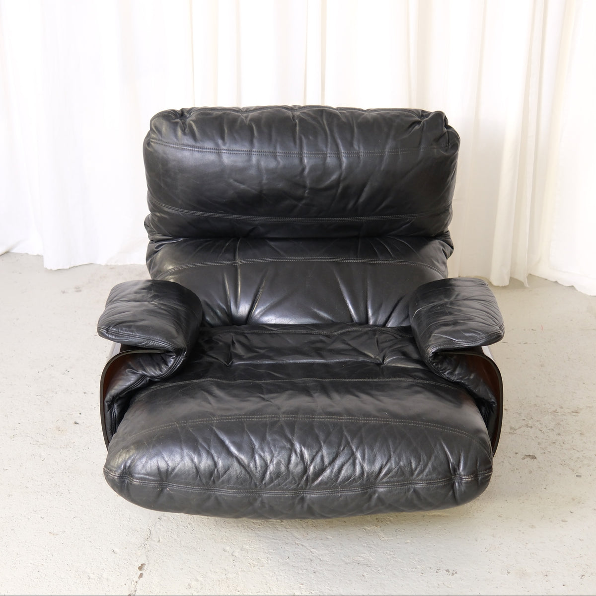 Front view of black leather Marsala lounge chair