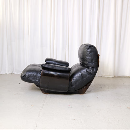 Marsala lounge chair with padded removable armrests, side view