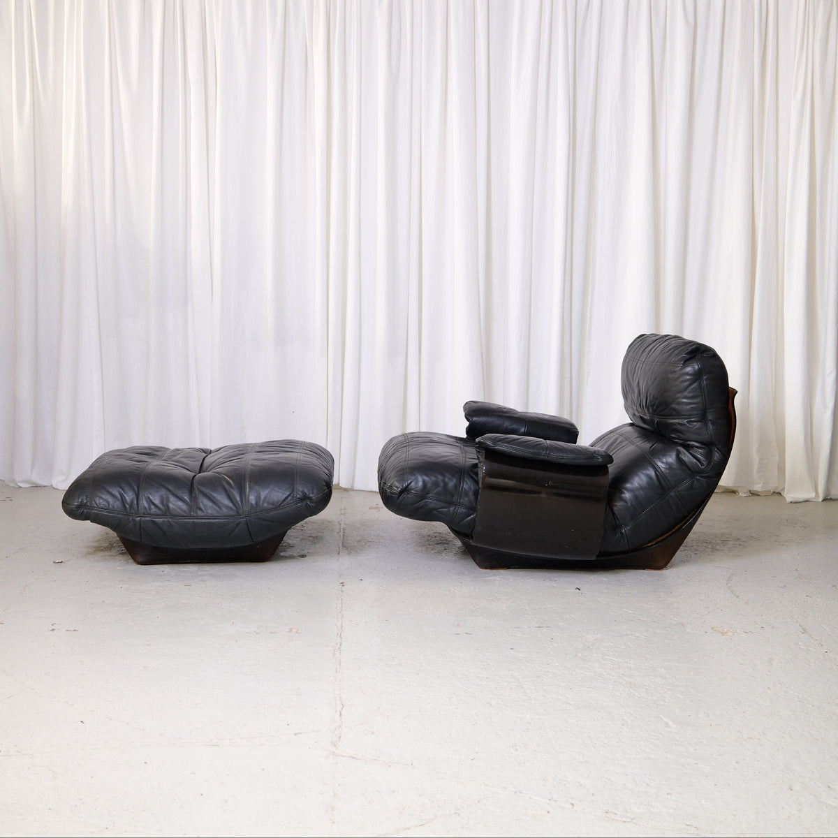 Marsala lounge chair and matching ottoman, side view
