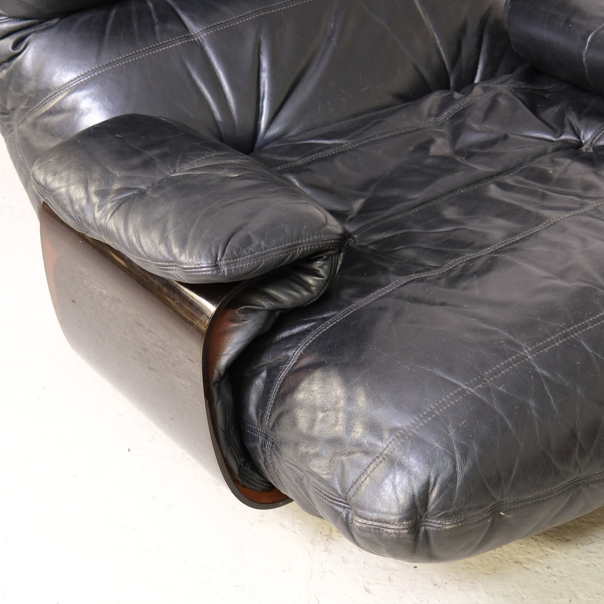Detail of leather seat, armrest cushion and acrylic side panel