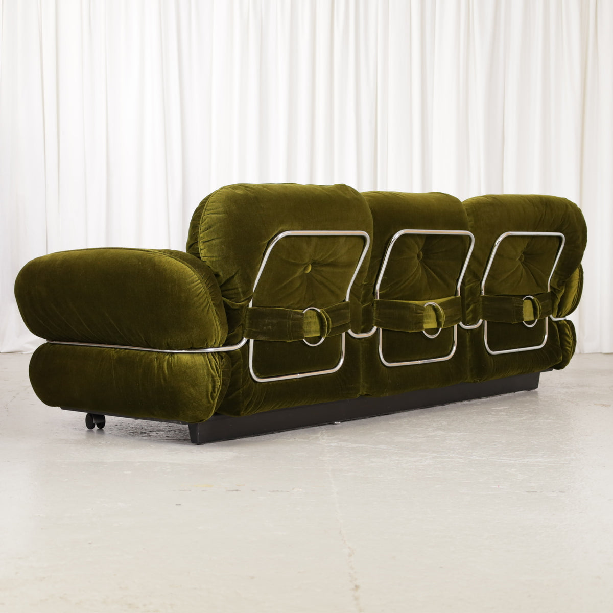 Isku Hannibal three-seater sofa in original green velvet, rear angle