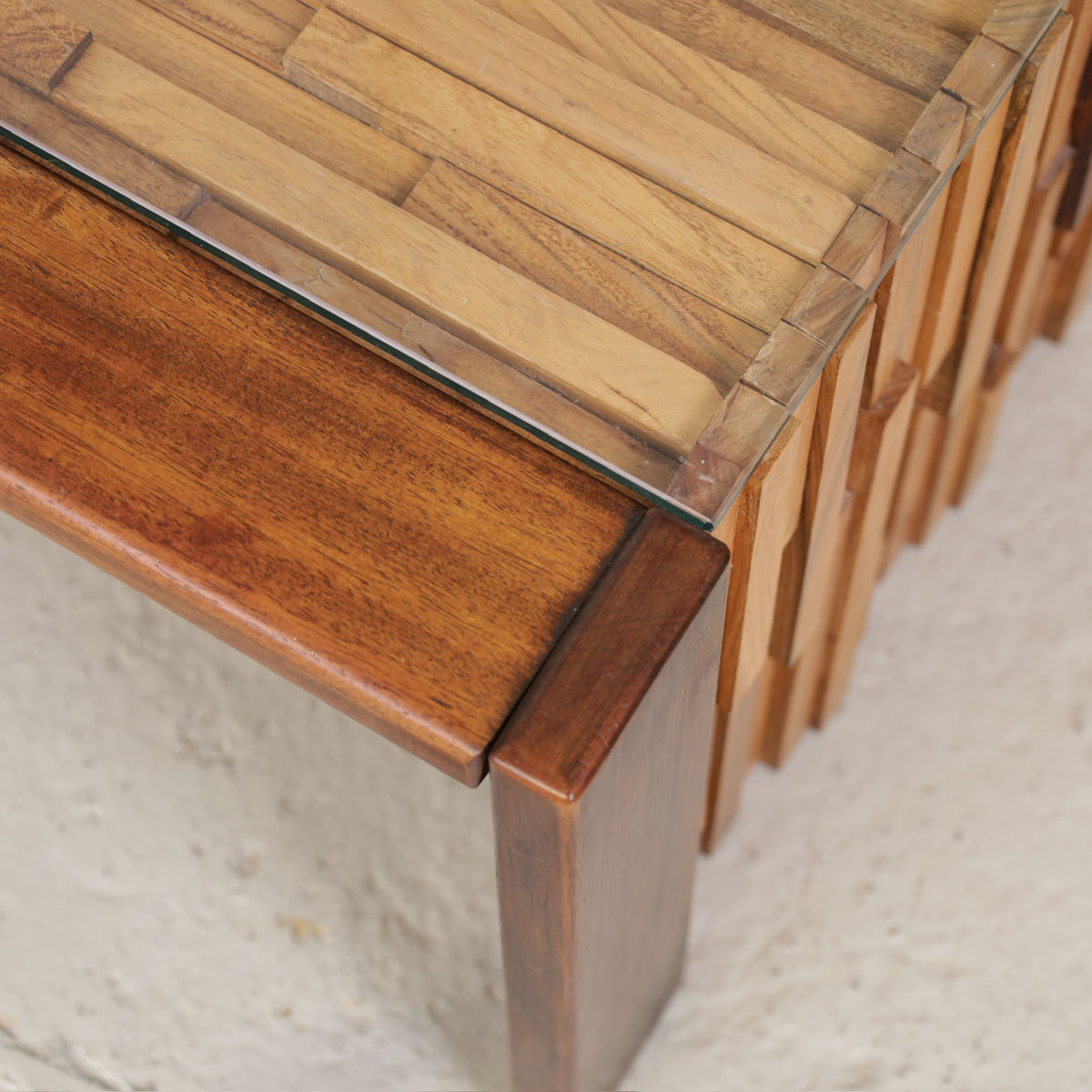 Close-up of glass edge and wooden frame