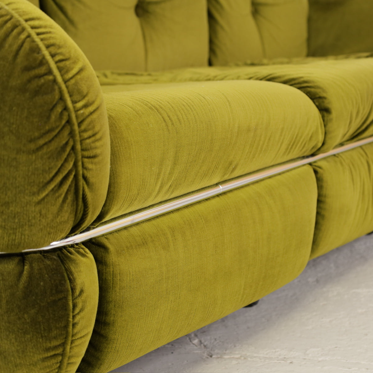 Isku Hannibal three-seater sofa in original green velvet, front chrome rail detail