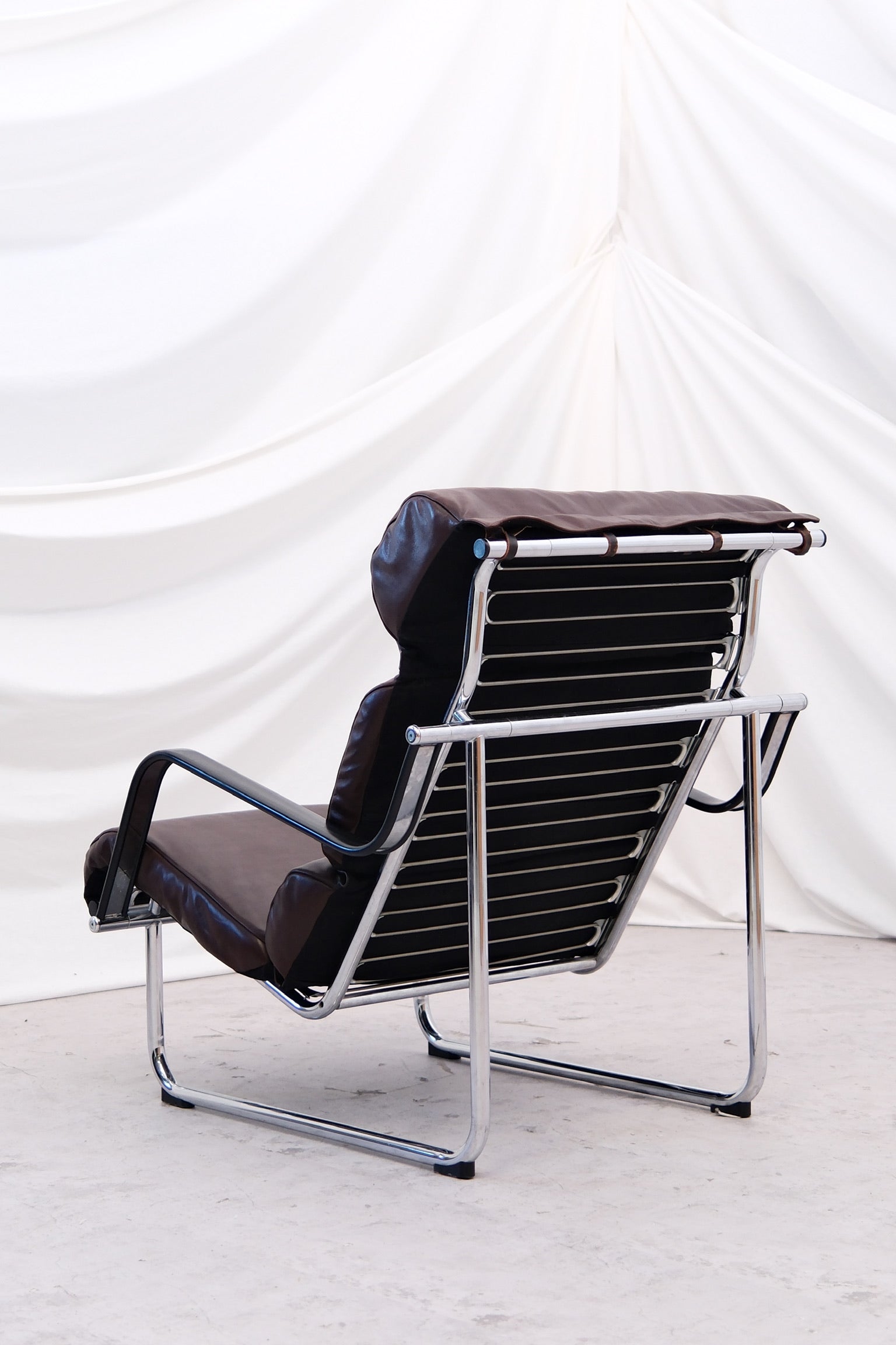 Yrjö Kukkapuro Remmi armchair, dark brown leather - Pino Interiors