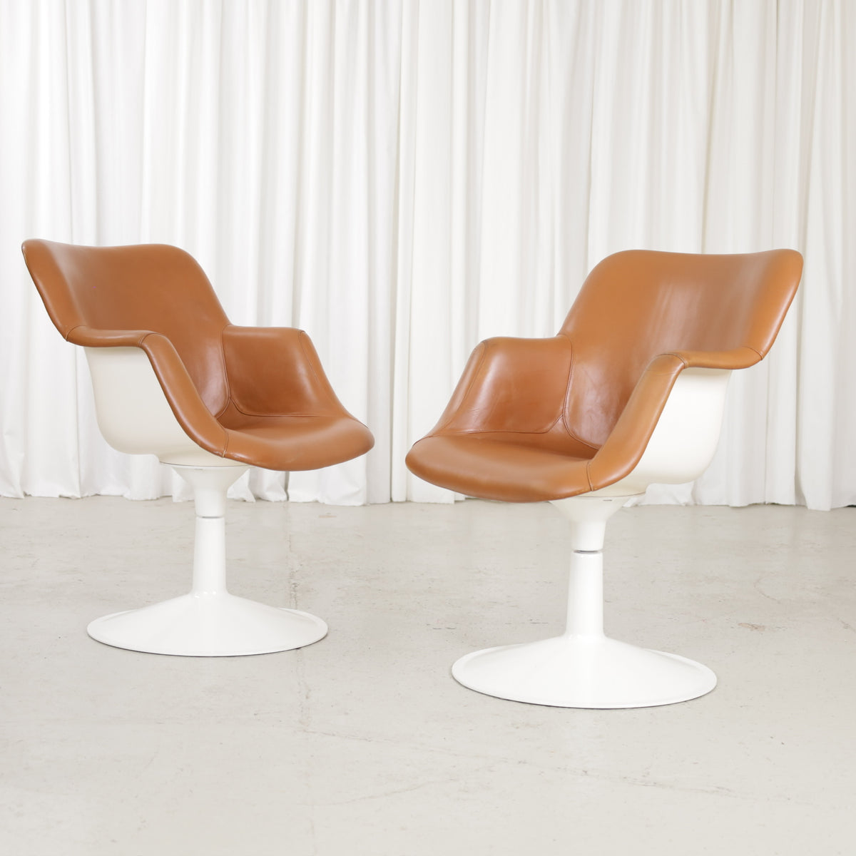 Yrjö Kukkapuro Junior chair in cognac leather – two chairs shown, sold individually