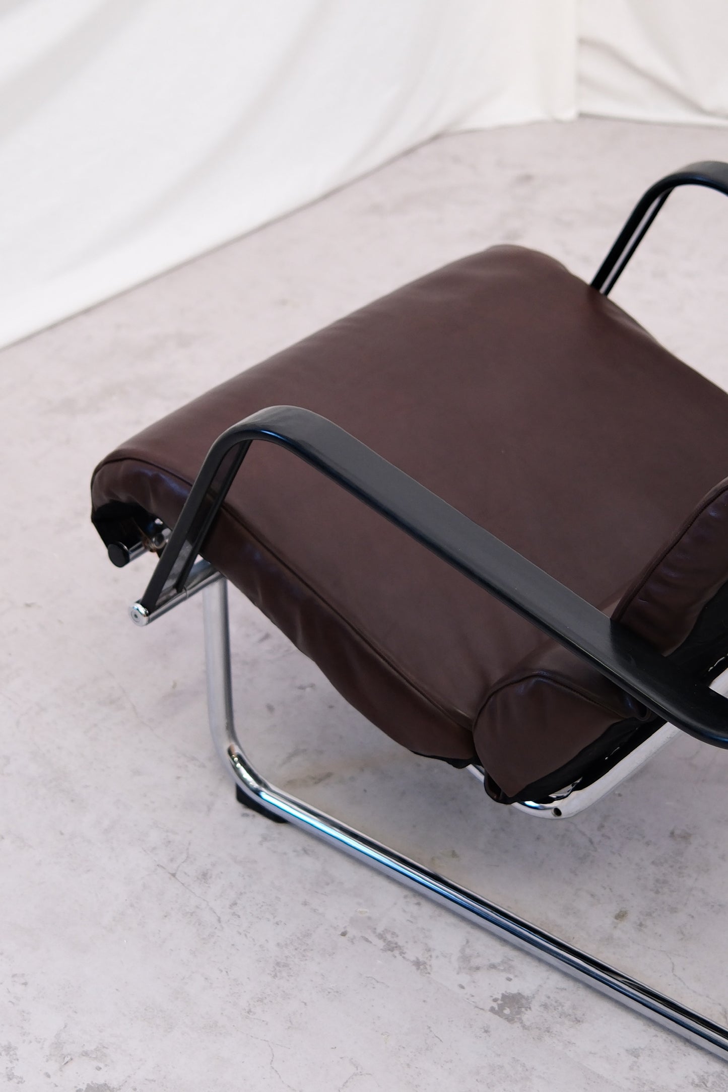 Yrjö Kukkapuro Remmi armchair, dark brown leather - Pino Interiors