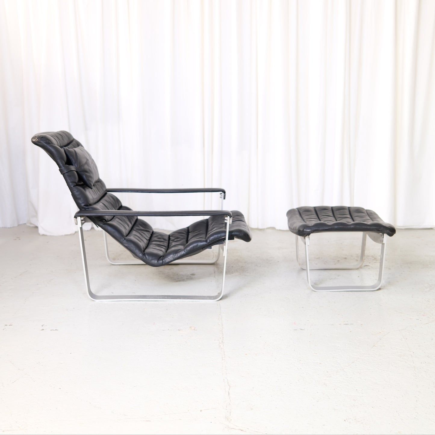 Ilmari Lappalainen Pulkka Lounge Chair with Ottoman in Black Leather