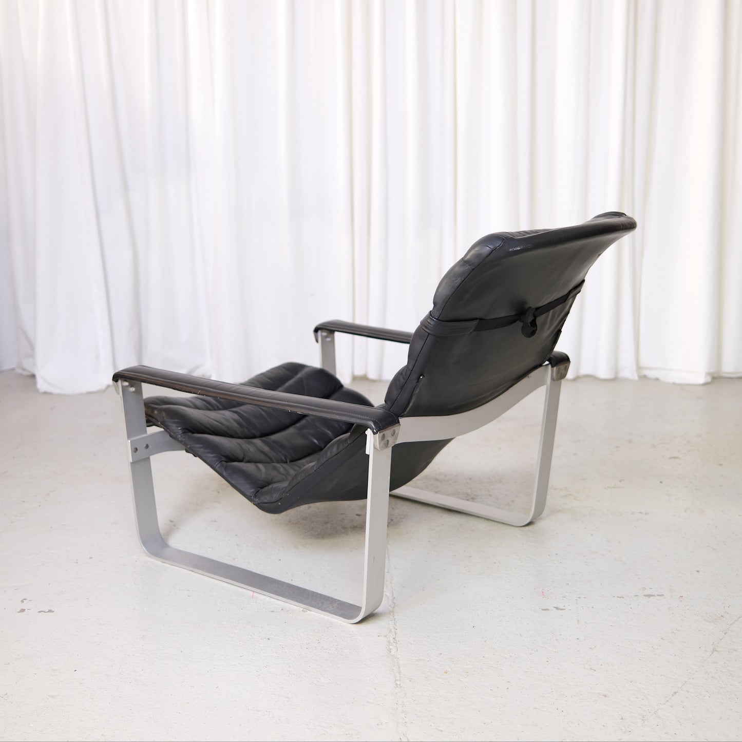 Ilmari Lappalainen Pulkka Lounge Chair with Ottoman in Black Leather