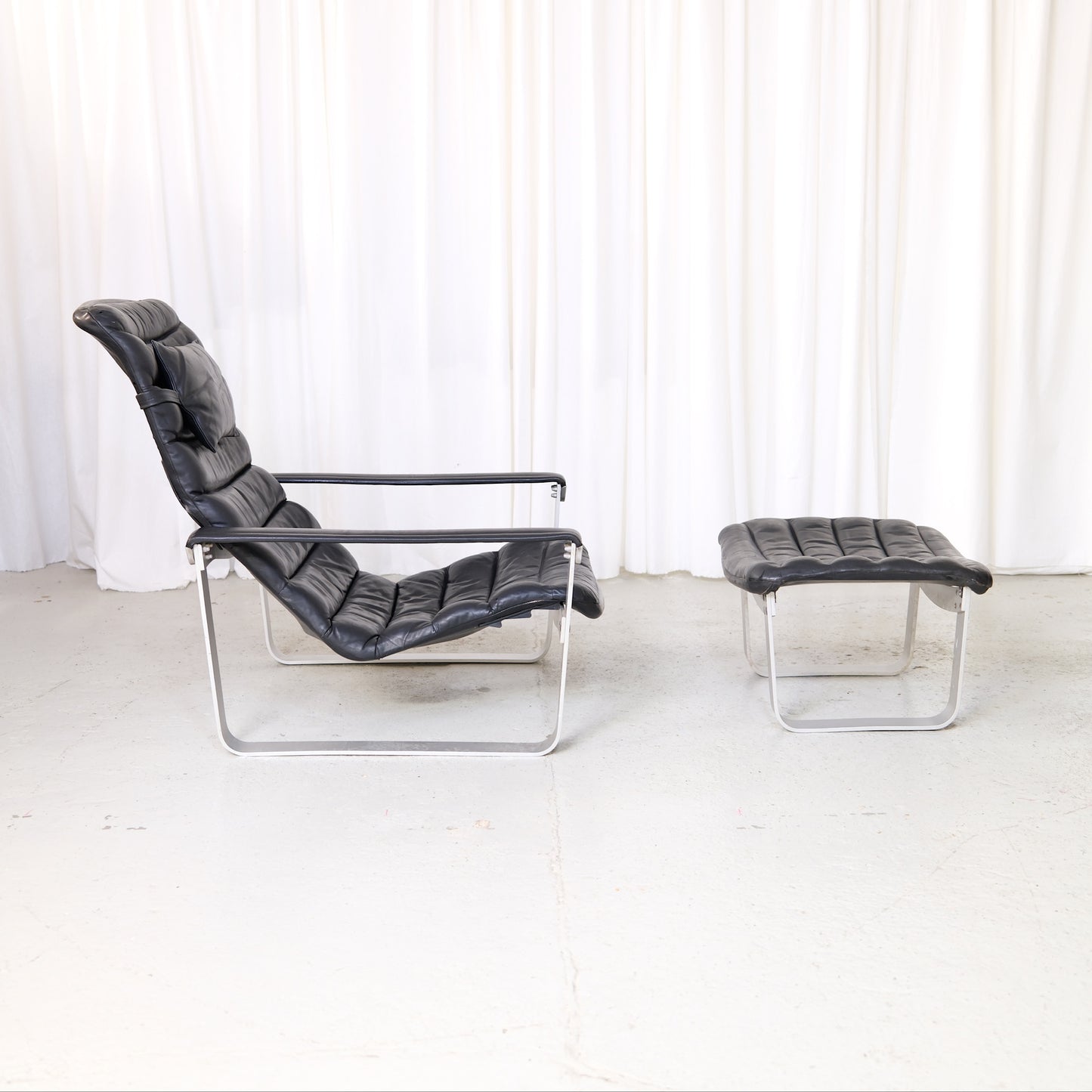 Ilmari Lappalainen Pulkka Lounge Chair with Ottoman in Black Leather