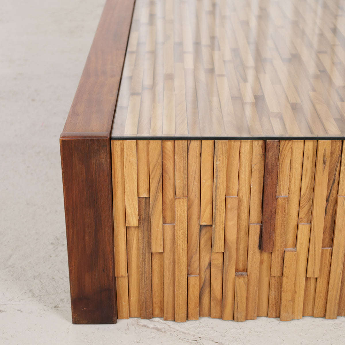 Wooden end panel and glass top detail