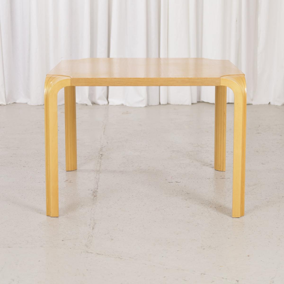 Artek Alvar Aalto X800C fan-leg coffee table, front view